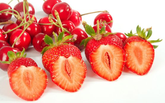 Ripe berries of a strawberry on a white sheet