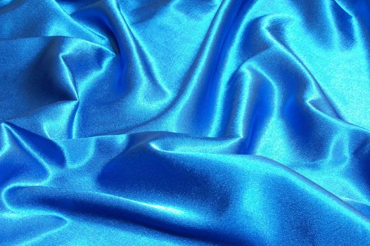 blue satin or silk background with textile texture