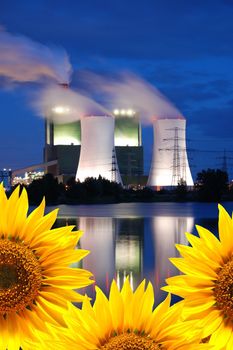 save the nature concept with sunflower and oil power plant