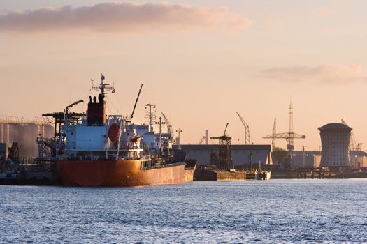 Ships on the river at colorful sunrise in october - horizontal