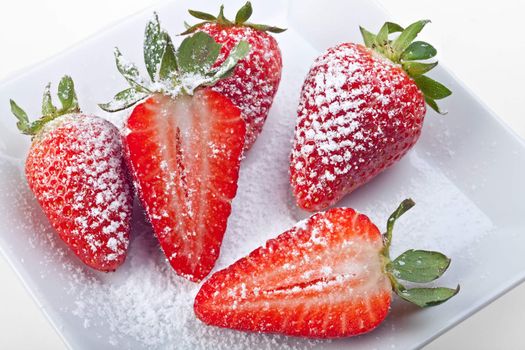 handfull of strawberries isolated on white