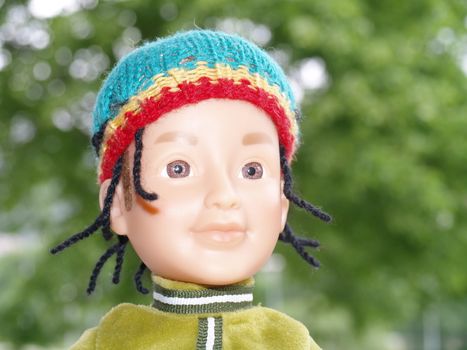 boy doll wearing rasta