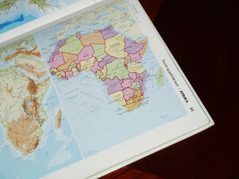 open atlas showing african continent