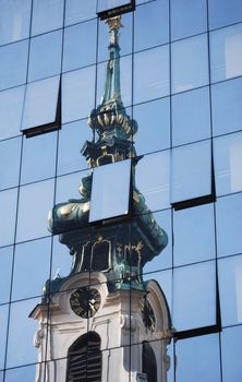 Churchs reflection in a modern hotel in Vienna