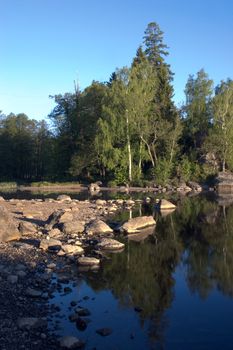 Russia, Vyborg, the Vyborg gulf. A landscape with a water table early in the morning