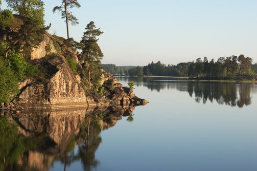 Russia, Vyborg, the Vyborg gulf. A landscape with a water table early in the morning