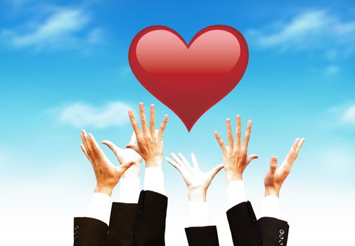 A red heart and men hands