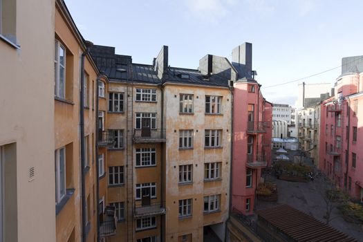 A Backyard view of city home buildings on nice fall day.