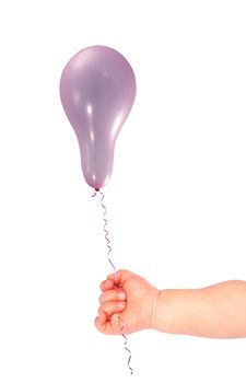 Nice balloon in the hand of a baby