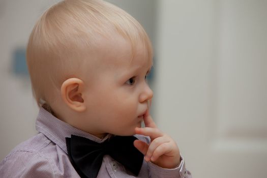 small child with bow tie. little baby