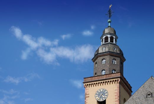 Church steeple against blue sky