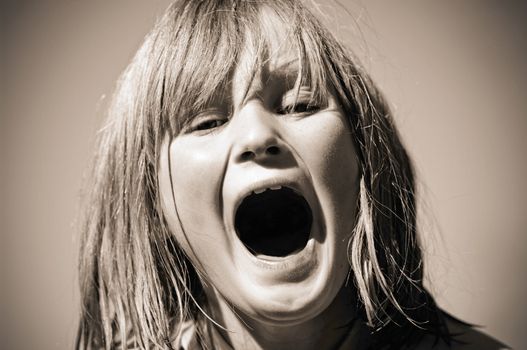 great image of a young girl mouth open yelling