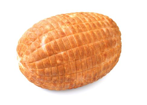 A whole ham isolated on white.