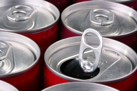 Aluminium containers for soda water, beer or the juice, one bank it is opened.