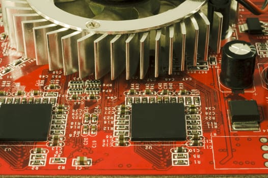 Closeup shot of a circuit board red background
