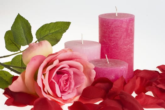 three candles and a rose