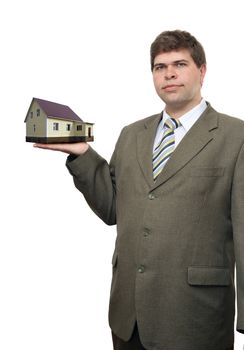 businessman with house in his hand