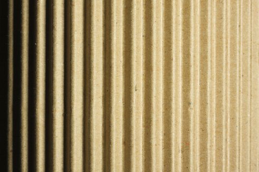 Rounded Corrugated Cardboard Background with Narrow Depth of Field.