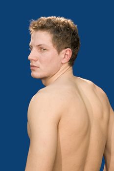 Torso of the man on a dark blue background