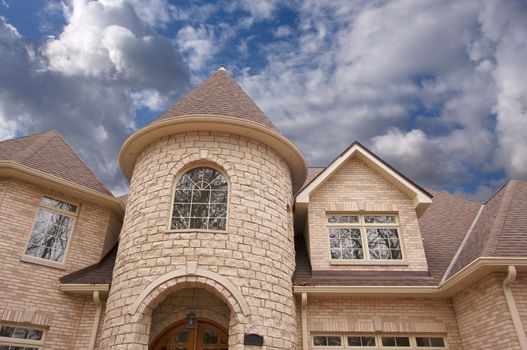 Majestic Newly Constructed Home Facade on a Blustry Day