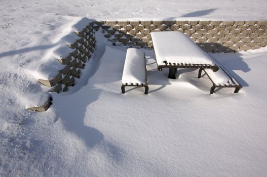 Picnic Table covered with Snow one Early Morning