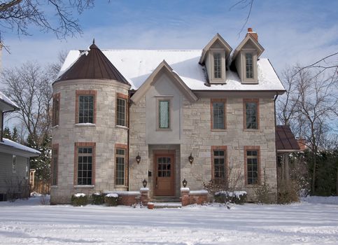 Majestic Newly Constructed Home Facade on a Blustry Day