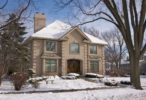 Majestic Newly Constructed Home Facade on a Blustry Day