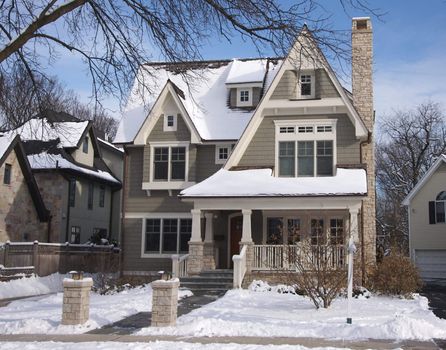 Majestic Newly Constructed Home Facade on a Blustry Day