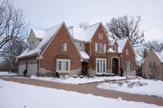 Majestic Newly Constructed Home Facade on a Blustry Day