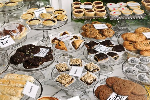 Various desserts on display in bakery window