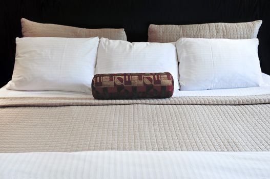 Comfortable bed in upscale hotel close up