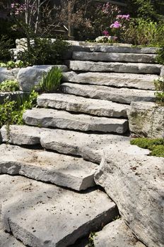 Natural stone landscaping in front of a house