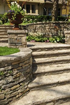 Natural stone landscaping in front of a house