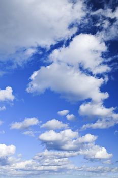 Background of blue sky with white clouds