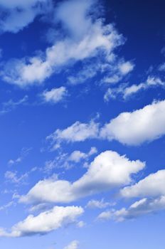 Background of blue sky with white clouds