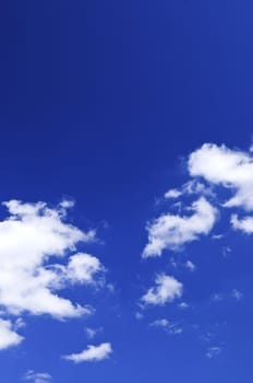 Background of blue sky with white clouds