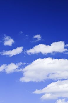 Background of blue sky with white clouds