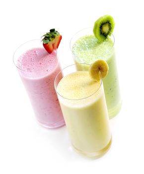 Various fruit smoothies isolated on white background