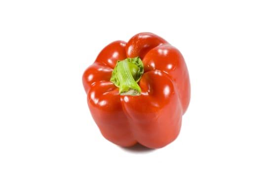 Fresh shiny red pepper isolated on white