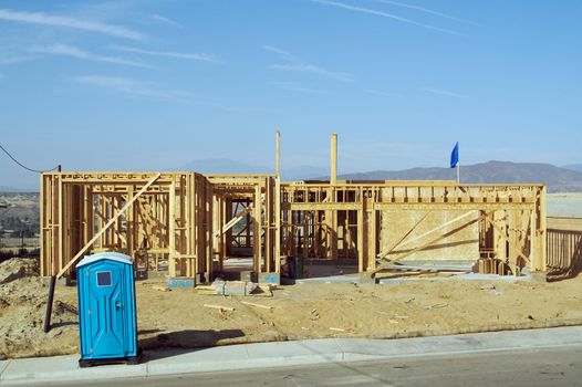 New residential construction home framing site.