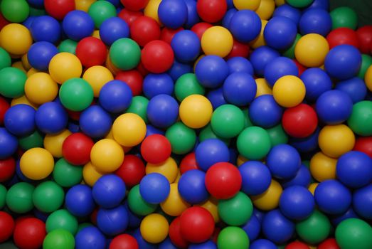 Multi-coloured toy balls.