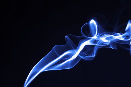 Dark blue smoke on  black background