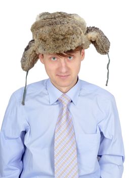 Portrait of young man in fur hat isolated on white background