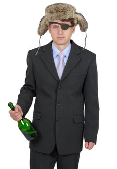 Funny drunk man in a fur hat with a bottle in his hand, stands on a white background