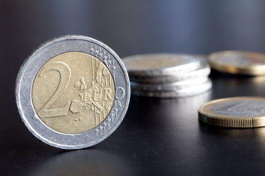 ouro money coin an black background with copyspace for textmessage