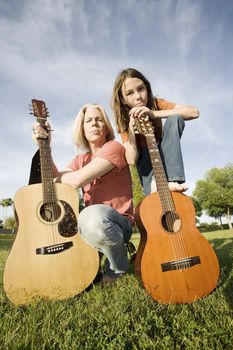 Father and son with guitars 