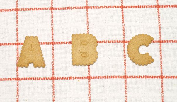 ABC written with bisquits