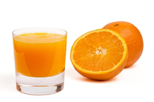 glass of orange juice and fruit, isolated