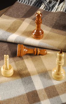 Chess on the woolen scarf
