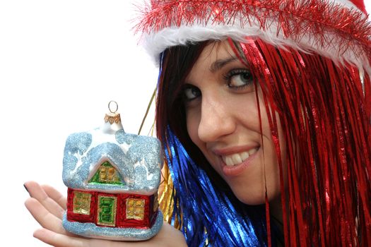 Christmas girl with new home, isolated on white